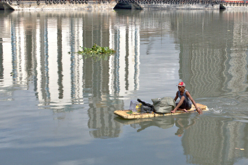The pasig River flows through Manila, supporting life in many ways; even the poorest people as they collect and recycle every discarded item, on land or on water!